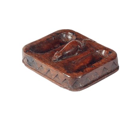 Robert 'Mouseman' Thompson; a carved oak twin section pin dish/ashtray, centred by a recumbent mouse, above a diamond tooth c