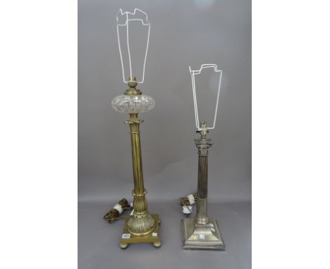 A Victorian brass table lamp (formerly an oil lamp), with foliate cast column and cut clear glass reservoir, on a square base