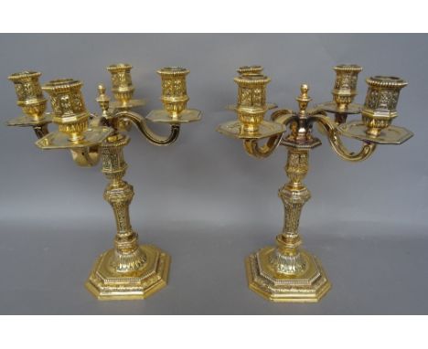 Christofle Paris, a pair of Louis XIV style gilt and silvered four light candelabra of canted square form, marked to undersid