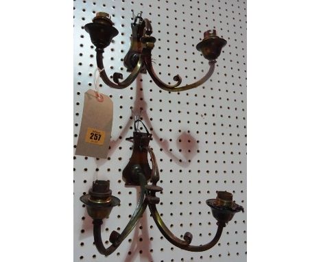 Lighting comprising; a pair of 20th century bronzed twin branch wall lights, a set of three gilt brass wall lanterns and anot