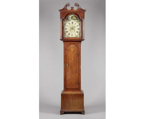 An oak longcase clockBy Thomas Waldie, Blyth, circa 1835The case with a swan neck pediment and sunflower terminals, above tur