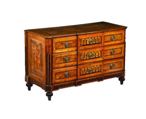 An 18th century German figured walnut and fruitwood commode and cabinet en suite, the commode with a pair of breakfront drawe