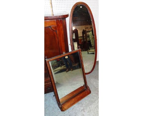 An early 20th century mahogany overmantel mirror, with integral shelf, 52cm wide x 75cm high, together with a 20th century ma