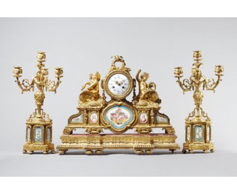 A Napoleon III ormolu and Sèvres style mounted clock garnitureSigned Pepin, A Paris, circa 1860The clock modelled with a pair