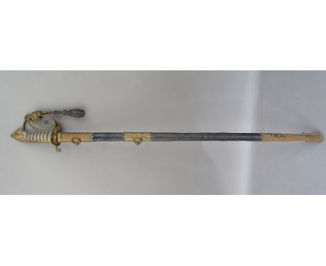 A British Naval officer's sword, 19th century, with straight engraved steel blade (80cm), folding brass hilt with naval cast 