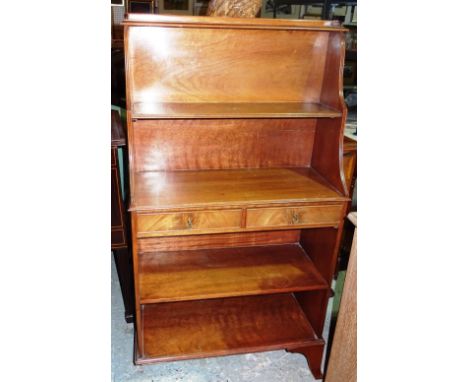 A 20th century mahogany waterfall bookcase, on bracket feet, 65cm wide x 118cm high.