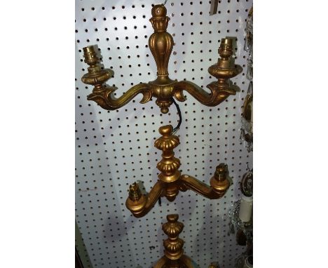 Lighting comprising; a group of eight similar 20th century gilt wood twin branch wall lights, ((8).  H10
