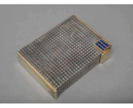 A lady's French silver, silver gilt and sapphire set powder compact cum lipstick, of rectangular form, the sprung hinged lid 