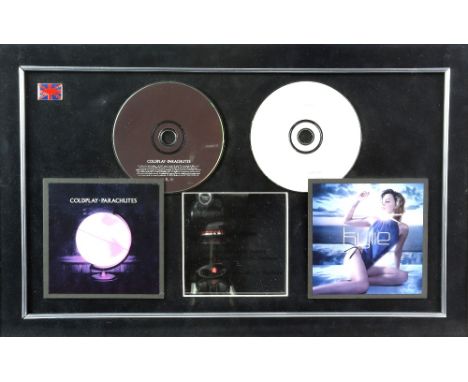 Official Parlophone Inhouse dual Award. Presented for sales of ! X Platinum of Kylie's 'Light Years' and 4 X Platinum of Cold