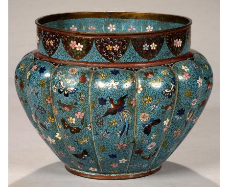 A JAPANESE LOBED CLOISONNE ENAMEL JARDINIERE, DECORATED WITH BIRDS, BUTTERFLIES AND FLOWERS ON A BLUE GROUND, 20CM H, MEIJI P