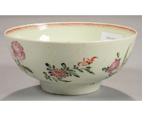 A LOWESTOFT POLYCHROME SLOP BASIN, PAINTED WITH FLOWER SPRAYS, LOOP AND DOT INNER BORDER, 16CM D, C1780 Minor short internal 