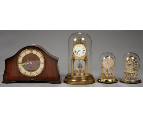 THREE BRASS ANNIVERSARY TIMEPIECES, EARLY 20TH C AND LATER AND A MID 20TH CENTURY WALNUT MANTEL CLOCK, 21.5CM H Good overall 
