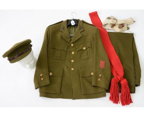 UNIFORM. A BRITISH ARMY LIEUTENANT'S TUNIC BY MICHAEL JAY, STOWMARKET, A PAIR OF TROUSERS AND A CAP Good condition