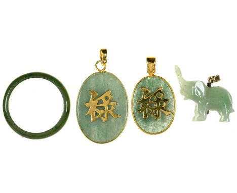 TWO CHINESE GOLD MOUNTED JADE DOUBLE SIDED PENDANTS, A JADE ELEPHANT CHARM AND A NEPHRITE RING Good condition