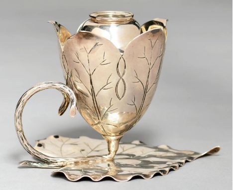 AN UNUSUAL VICTORIAN NATURALISTIC SILVER WATERLILY SHAPED CHAMBER LAMP ON LEAF SHAPED BASE, THE BIFURCATED STALK LOOPED TO FO
