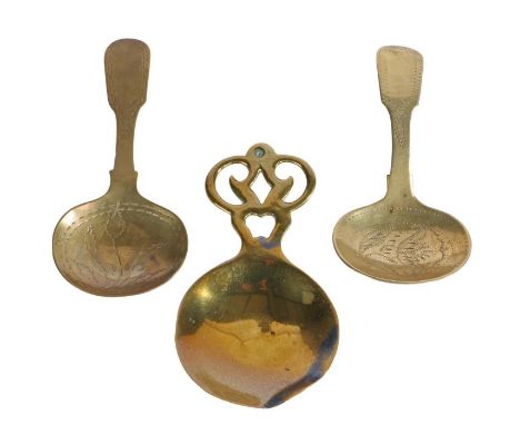Three 19th century brass caddy spoons, English

Two of similar design, engraved, and with fiddle-pattern handle, one with pse