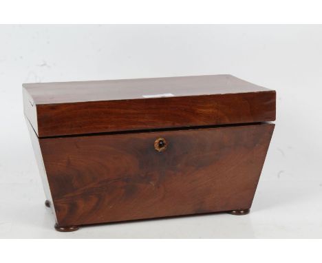 Large early Victorian flame mahogany tea caddy, with a rectangular top opening to reveal three compartments with lids above a