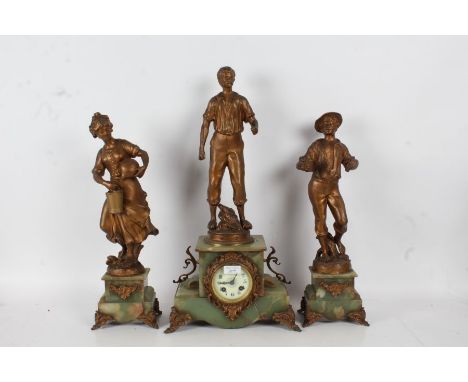 A 20th century onyx and gilt metal clock garniture, set with farmers on a onyx and gilt metal base, the white dial with Arabi