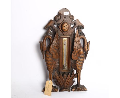 A 19th century oak Heron wall thermometer, height 40cm 
