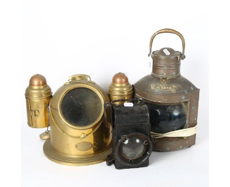 A Victorian ship's copper starboard lantern converted to electric, a railway lantern with bull's eye glass panels, and a repr