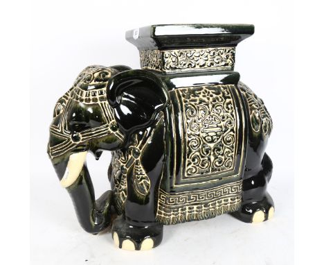 A ceramic elephant garden seat or pot stand, length 50cm, height 45cm, width 18cm 