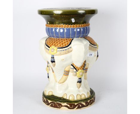 An Oriental ceramic garden seat with elephant support, 47cm 