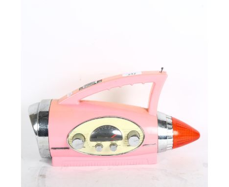 WING LIGHT - a Vintage pink Cadillac Wing Light radio 