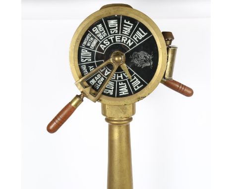 A ship's engine order telegraph, brass frame with oil lantern mount and working handles, height excluding handles 86cmNo dama