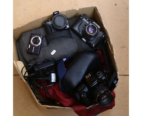 Various Vintage cameras and hand-held video recorders, and lenses, including Fugix-8 video recorder, Lumix, Canon, Samsung et
