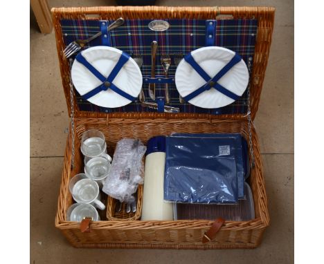 An Optima wicker hamper and contents 