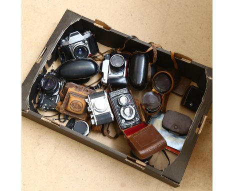 A quantity of Vintage cameras and lenses, including Rollecord Franke & Heidecke, Olympus, Miranda etc 