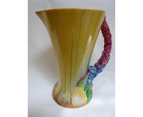 Bizarre by Clarice Cliff Wilkinson conical jug with floral handle and drip glaze, 22cm in Height 