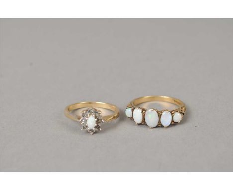 A 9ct gold graduated five stone opal ring, size P 1/2, together with a 9ct gold opal and diamond cluster ring, size O, total 