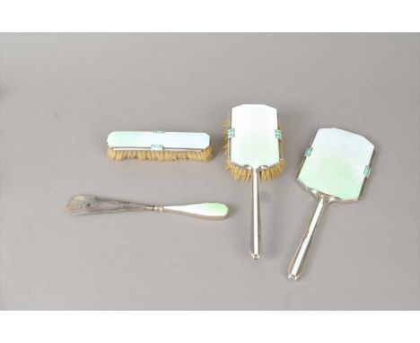 An Art Deco four piece silver and enamel mounted dressing set, Albert Carter, Birmingham 1936 and 1937, each piece with gradu