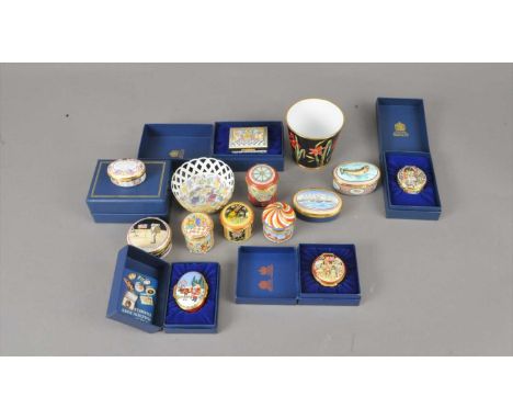 A collection of 14 Halcyon Days enamelled boxes, including one in the form of a carousel, lacking musical movement, 6cm, one 