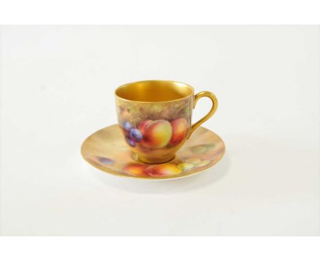 A Royal Worcester fruit-decorated cabinet cup and saucer dated 1926 and 1928 painted by Harry Powell, artist signed, printed 