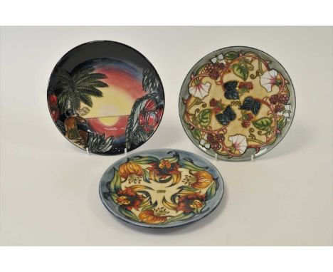 Three Moorcroft Year Plates comprising 1998 'Summer End', 1999 'Tiger Lily' and 2000 'Birth of Light', limited editions, pain