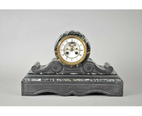 A large Victorian black slate and green marble cased mantle clock, the drum cased white enamel dial with black Roman numerals
