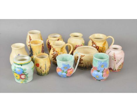 A good collection of E Radford Burslem Staffordshire pottery circa 1920s-30s hand-painted with flowers, comprising assorted v