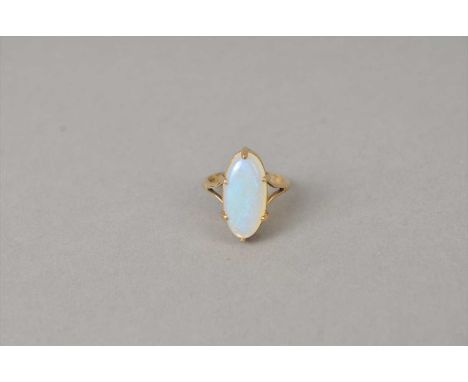 A opal dress ring, designed as an oval opal cabochon claw set to yellow metal shank stamped '9ct', ring size P, weight approx