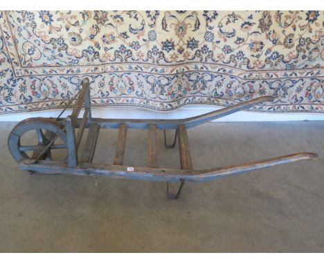 A vintage single-wheel produce barrow in original grey paint, treated with exterior oil - 165cm L x 59cm W 