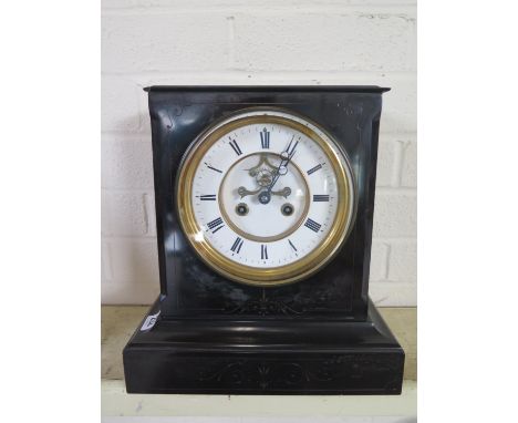 A black slate Victorian mantle clock with exposed escapement - 31cm tall x 29cm x 15cm generally good, small chips to slate w