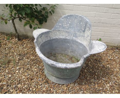 A Victorian tin hip bath 59cm H x 64cm x 79cm - ideal garden planter 