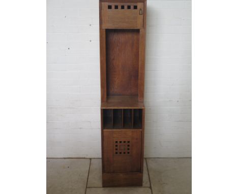 CHARLES RENNIE MACKINTOSH - An oak upright cabinet originally one of a pair from the Blue bedroom of Hous'hill Nitshill Glasg