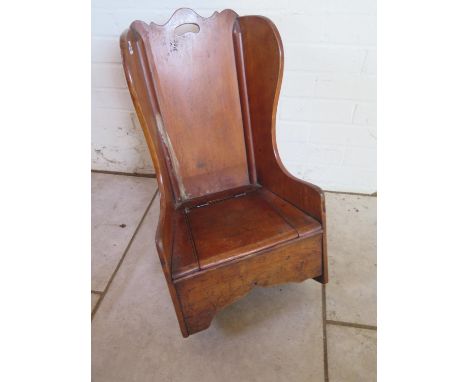 A 19th Century mahogany childs rocking chair commode - 66cm H x 38cm 
