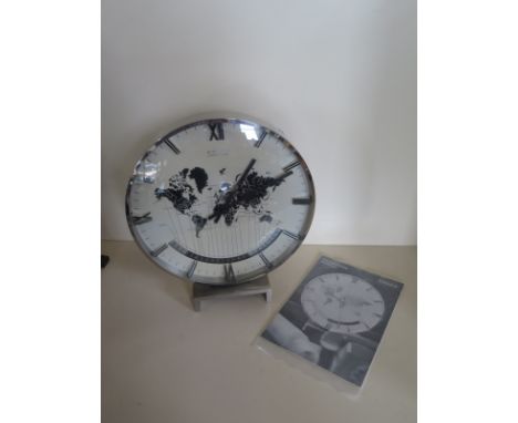 A Kienzle International world time zone electric drum mantle clock - 29cm tall x 26cm diameter, in good clean running order w