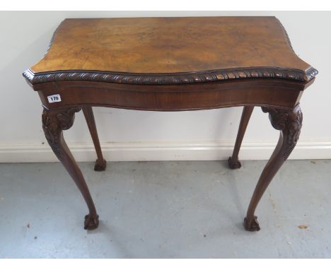 A circa 1920's walnut fold over card table - 76cm W x 76cm H - in clean restored condition 