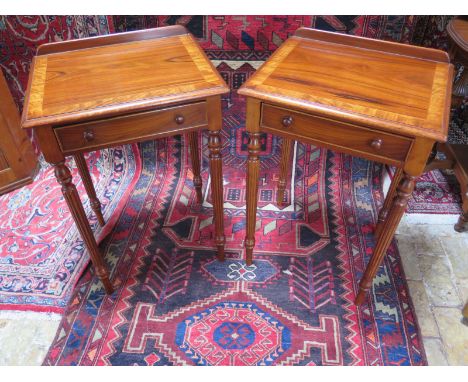 A pair of rosewood cross banded lamp tables on reeded legs  - 73cm H x 52cm W x 42cm D -made by a local cabinet maker and in 