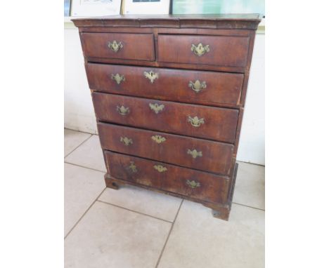 A Georgian walnut chest with two short over four long graduating drawers on bracket feet with pine sides - 120cm H x 96cm x 4