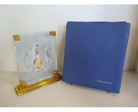 A Jaeger-LeCoultre 8 day Baguette mantle clock with gilt metal mounts - number 319 in original box - 20cm H x 19cm W x 5cm D 